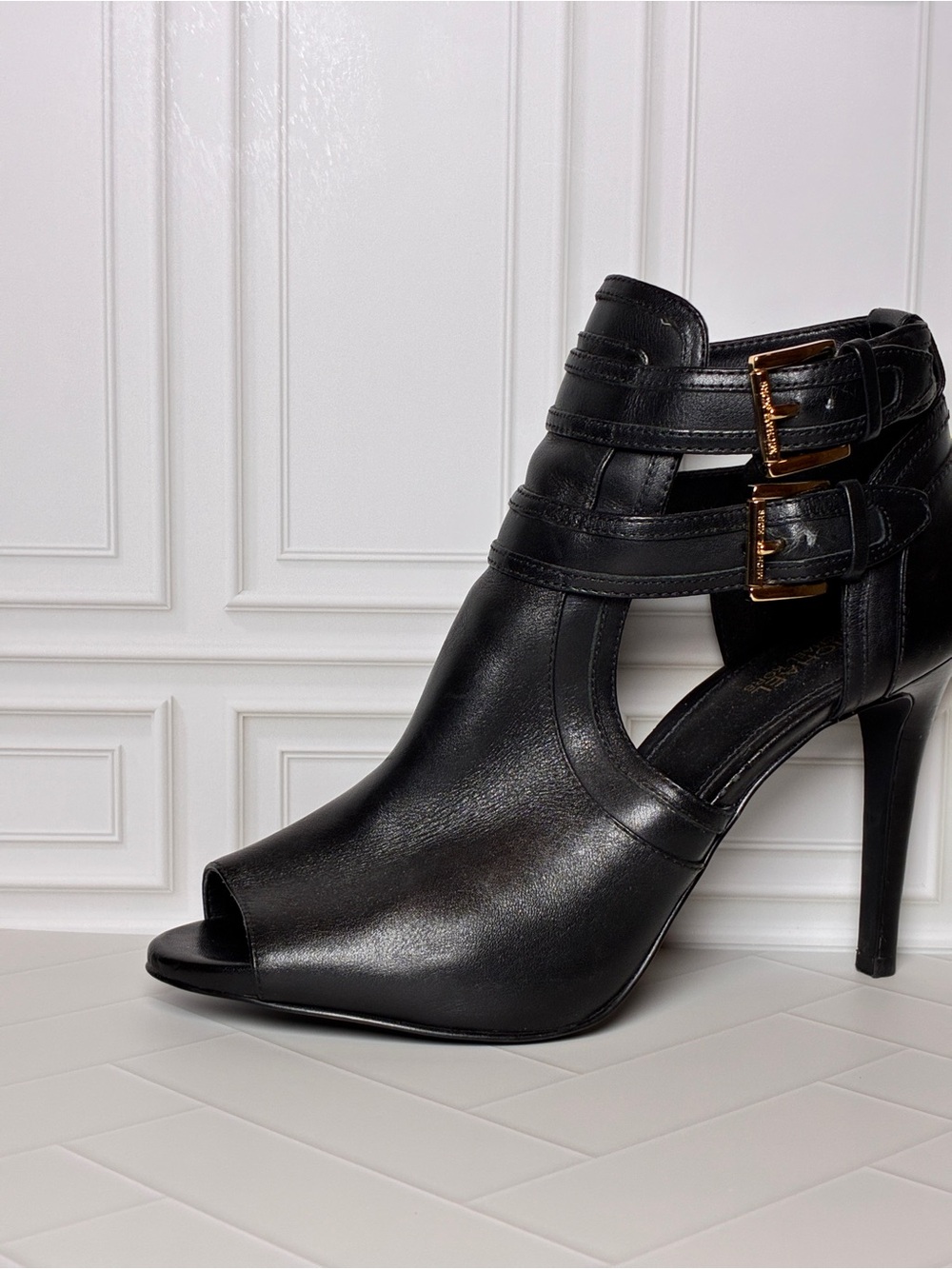 MICHAEL Michael Kors Black Open-Toe Strappy Stiletto Bootie with Gold Buckles